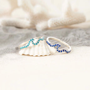 LIFE IS LIKE THE OCEAN PAVÉ WAVE RING