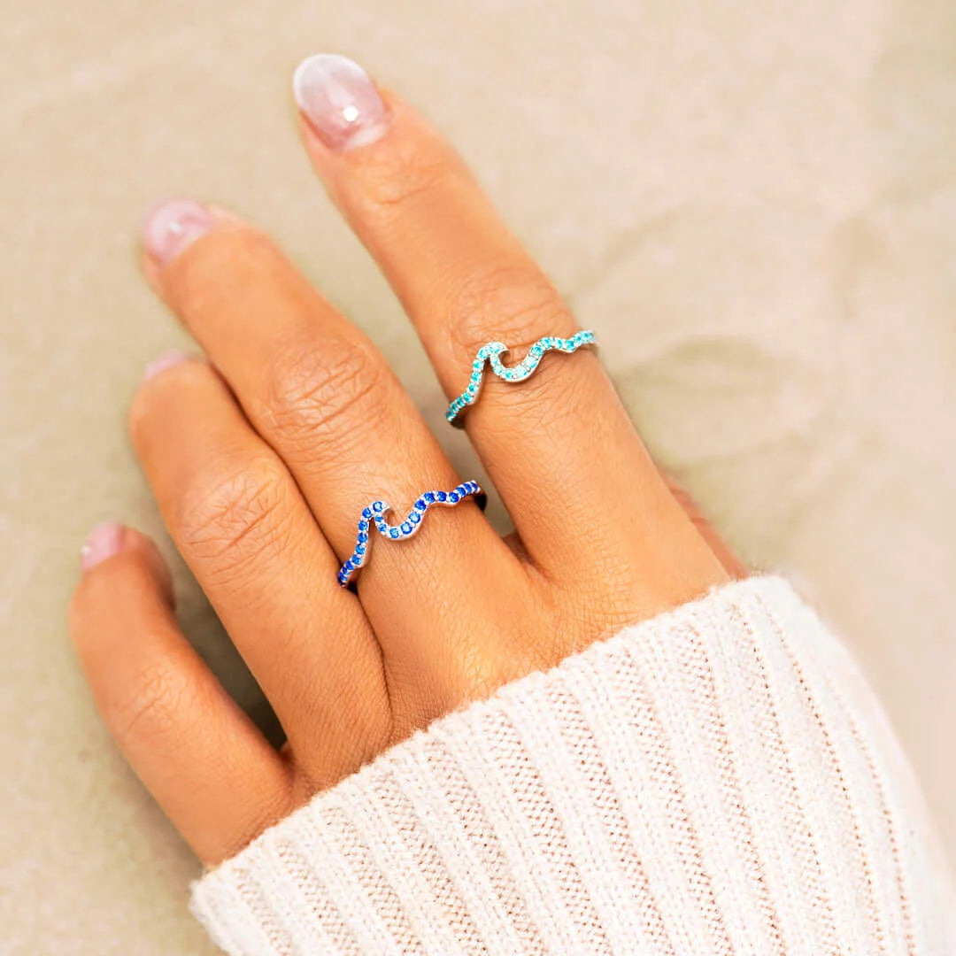 LIFE IS LIKE THE OCEAN PAVÉ WAVE RING