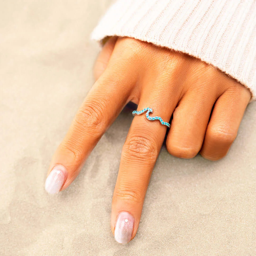 LIFE IS LIKE THE OCEAN PAVÉ WAVE RING