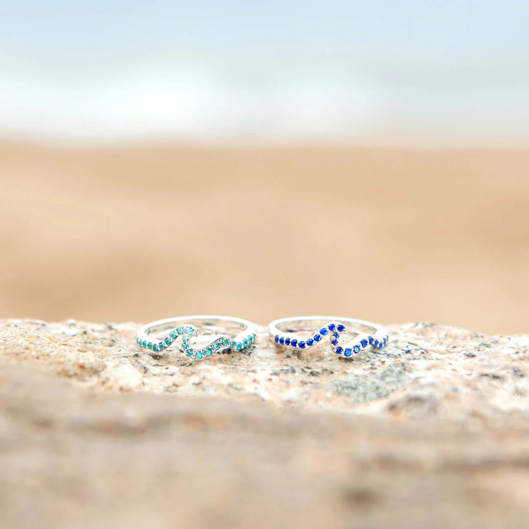 LIFE IS LIKE THE OCEAN PAVÉ WAVE RING